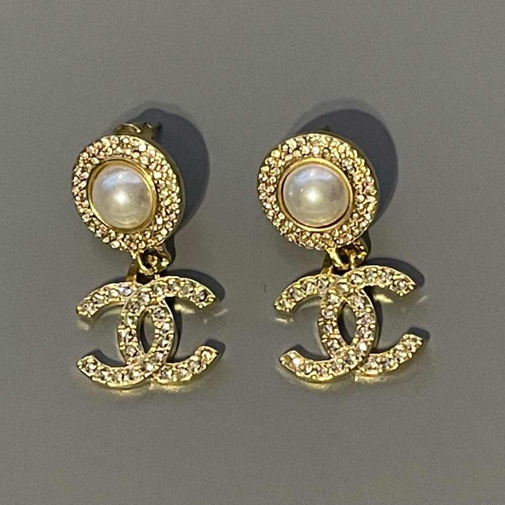 Chanel earrings never worn